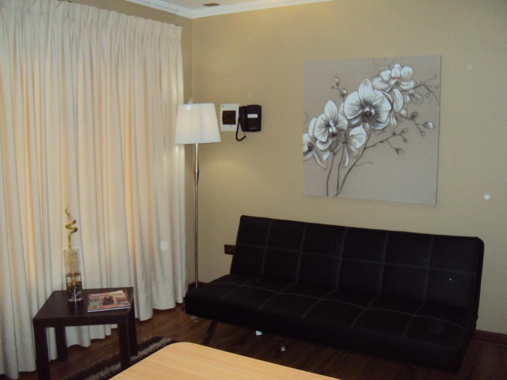 Apart Hotel Cancura Chillán Habitación foto